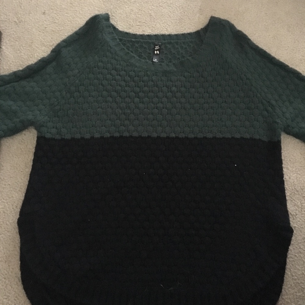 Green and black sweater